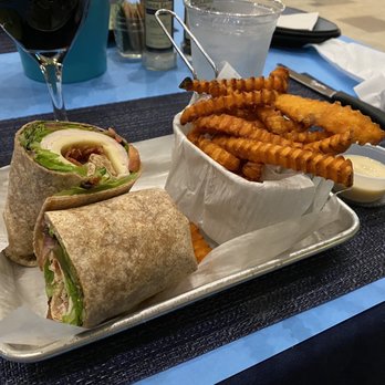 Counter Culture Beachside - GOBBLER WRAP with turkey and sweet potato fries - New American Near Me - Vero Beach, Florida
