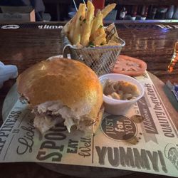 Sky Box Sports Bar & Grill - Cheeseburger, truffle fries and a side of spicy aioli.