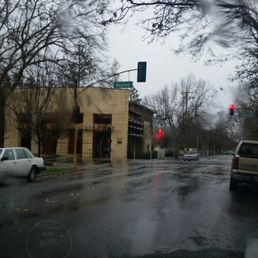 Waiting for its doors to open.  Loving the quiet rain as I wait in peace.