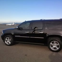 Elite limousine picks up at private jet in napa.