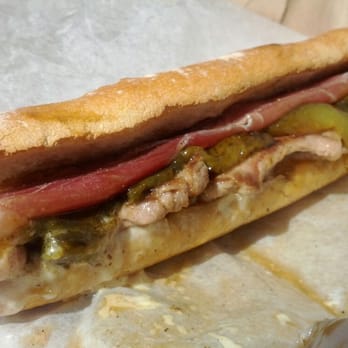 Pepe - Pepito de Iberico: seared Iberico pork and Serrano ham, roasted green peppers, caramelized onions, aioli - Food Trucks Near Me