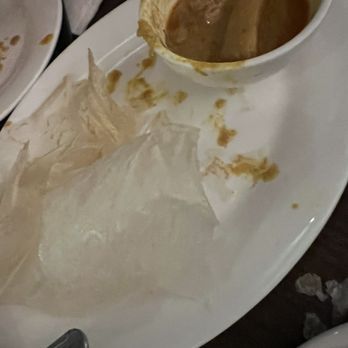 Nyonya - Leftover Roti Canai ($5.95) - way too paper-thin to pick up any sauce! - Malaysian Near Me - New York, New York Nyonya - Leftover Roti Canai ($5.95) - way too paper-thin to pick up any sauce! - Malaysian Near Me - New York, New York