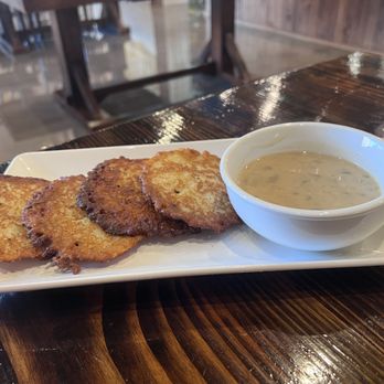 Smakosz Restaurant - Potato Pancake with mushroom sauce - Polish Near Me - Chicago, Illinois Smakosz Restaurant - Potato Pancake with mushroom sauce - Polish Near Me - Chicago, Illinois