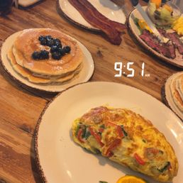 blueberry pancakes and Popeye omelete blueberry pancakes and Popeye omelete