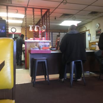 Rasheedah's Cafe - Sitting at a table near the soda machine. - Soul Food Near Me - Cincinnati, Ohio