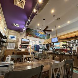 Morning View Coffee House & Roastery - Beautiful beachy decor. That painting is stunning
