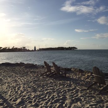 Tranquility Bay Beachfront Resort - Chairs interspersed for semi-secluded sunset viewing - Resorts Near Me - Marathon, Florida Tranquility Bay Beachfront Resort - Chairs interspersed for semi-secluded sunset viewing - Resorts Near Me - Marathon, Florida