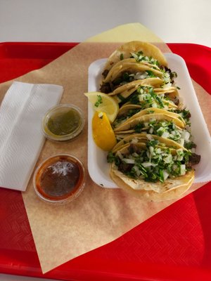 Photo of Adalberto's Mexican Food - Santa Ana, CA, US. Asada mini Taco Tuesday deal $1 each. Delicious. Reminds me of Ensenada.