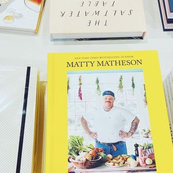 Tidewater Home & Gift - a cookbook and cookbooks on a table - Home Decor Near Me - Winter Park, Florida