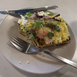 Got an egg toast with fresh herbs, and radishes Got an egg toast with fresh herbs, and radishes