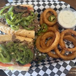 Cheesesteak hoagie (includes lettuce and tomato) with peppers, mushrooms, and grilled onion. Excellent. Cheesesteak hoagie (includes lettuce and tomato) with peppers, mushrooms, and grilled onion. Excellent.
