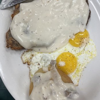 The Breakfast Place - County Fried Steak, Sunny Side Eggs, and Biscuit with gravy - Breakfast & Brunch Near Me - Spring, Texas