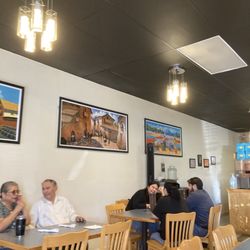 Rocotos Grill Peruvian cuisine - More decoration and people enjoying their food