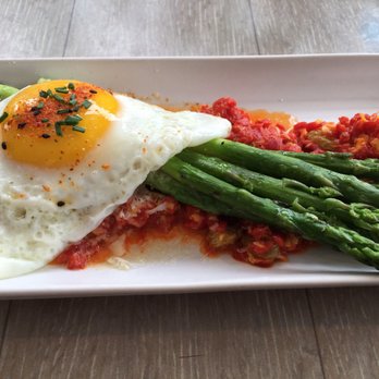 Driftwood Kitchen - Asparagus bundle with a farm egg, Parmesan and pequillo pepper sauce - Seafood Near Me - Laguna Beach, California Driftwood Kitchen - Asparagus bundle with a farm egg, Parmesan and pequillo pepper sauce - Seafood Near Me - Laguna Beach, California