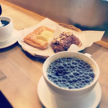 Le Panier - Coffee, chocolatine, and apple croissant - Bakeries Near Me - Seattle, Washington