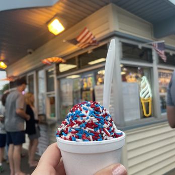 Frosty Freez - a person holding a cup of ice cream - Ice Cream & Frozen Yogurt Near Me - Middletown, Rhode Island Frosty Freez - a person holding a cup of ice cream - Ice Cream & Frozen Yogurt Near Me - Middletown, Rhode Island