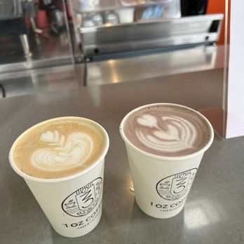 1 Oz Coffee - Honey latte with regular milk (left) and dirty chai latte with oat (right) - Caterers Near Me - Santa Clara, California