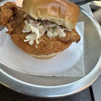 Delwood - Fried Chicken Sandwich - Aji amarillo aioli, coleslaw on a toasted potato bun - Gastropubs Near Me - Cincinnati, Ohio