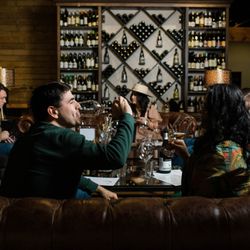 The PA Market - Gather with friends in our cozy couch seating in the Wine Library!
