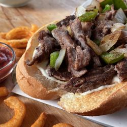 Tamiami Subs - Garlic Cheesesteak with onions, peppers, and mushrooms, curly fries
