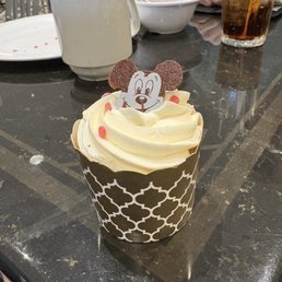 Birthday cupcake at breakfast