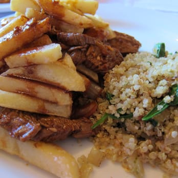 Q'ero Restaurant - lomo saltado: steak strips, fries and quinoa with spinach and onions - Latin American Near Me - Encinitas, California Q'ero Restaurant - lomo saltado: steak strips, fries and quinoa with spinach and onions - Latin American Near Me - Encinitas, California