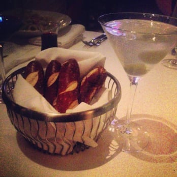 T-Bones - Bread basket full of pretzel bread and a dirty martini - Steakhouses Near Me - Las Vegas, Nevada