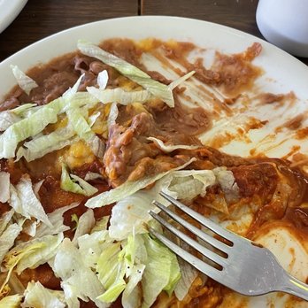 Mesa Vista Cafe - a plate of enchilada with a fork and knife - Diners Near Me - Ojo Caliente, New Mexico