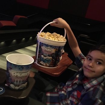 Santikos Embassy - Got all he wanted and more! He likes those big recliners with the attached tray! - Cinema Near Me - San Antonio, Texas