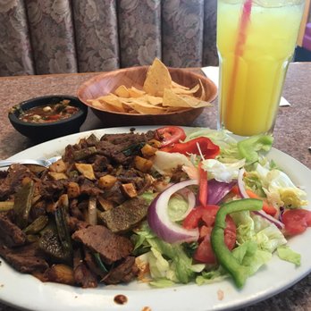 Cañadas Grill - Steak ala mexicana with my delicious pineapple drink. And let's not forget their salsa and chips. - Mexican Near Me - Long Beach, California