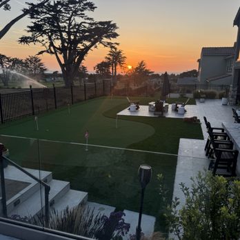 Garden Solutions Landscaping - Backyard putting green and gas fireplace - Landscaping Near Me Garden Solutions Landscaping - Backyard putting green and gas fireplace - Landscaping Near Me