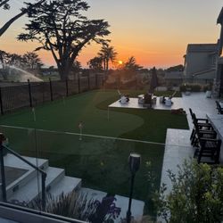 Garden Solutions Landscaping - Backyard putting green and gas fireplace
