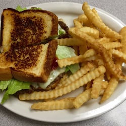 Riverside Restaurant - Riverside burger on garlic toast w/ pepper jack & bacon.