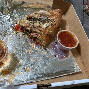 Nino's Pizza - Half Eaten Stromboli! - Pizza Near Me - Mobile, Alabama