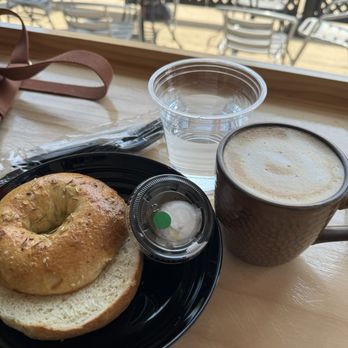 Loaves & Witches - Rosemary bagel with vegan cream cheese. Plastic cups, plastic utensils, plastic container for cream cheese. - Bagels Near Me - Chicago, Illinois Loaves & Witches - Rosemary bagel with vegan cream cheese. Plastic cups, plastic utensils, plastic container for cream cheese. - Bagels Near Me - Chicago, Illinois