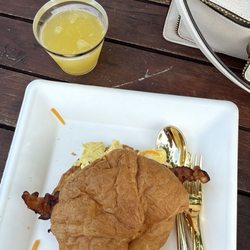 The Plaza Bistro - Bacon, egg and cheese croissant with a mimosa