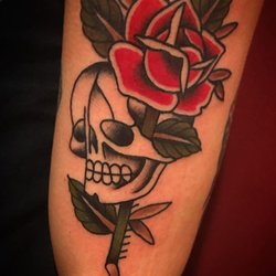 Rock of Ages Tattoos & Body Piercing