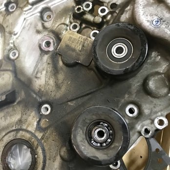 Advanced Automotive - Greg showing me the damage - Auto Repair Near Me - Golden, Colorado