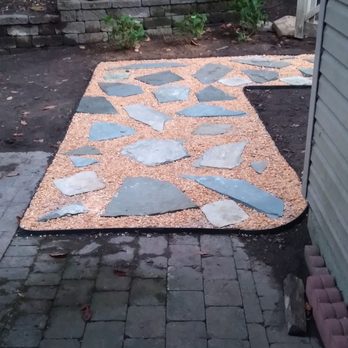 Grow N Mow - a patio with a flower pattern on it - Lawn Services Near Me - Oxford, Pennsylvania Grow N Mow - a patio with a flower pattern on it - Lawn Services Near Me - Oxford, Pennsylvania