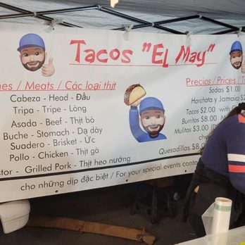 Tacos El May - a woman preparing food under a tent - Street Vendors Near Me - Westminster, California Tacos El May - a woman preparing food under a tent - Street Vendors Near Me - Westminster, California