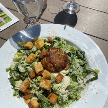 Decoys Seafood - Caesar salad with crabcake - Seafood Near Me - Suffolk, Virginia Decoys Seafood - Caesar salad with crabcake - Seafood Near Me - Suffolk, Virginia