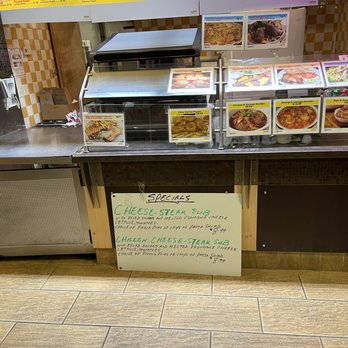 Sugarbee's Cafe & Grill - a menu on the counter - American Near Me - Baltimore, Maryland Sugarbee's Cafe & Grill - a menu on the counter - American Near Me - Baltimore, Maryland
