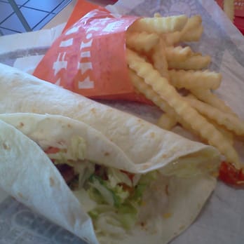 Del Taco - I opened the chicken burrito to show a little and a small crinkle fries. - Fast Food Near Me - Reno, Nevada Del Taco - I opened the chicken burrito to show a little and a small crinkle fries. - Fast Food Near Me - Reno, Nevada