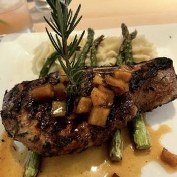 Rio Grill - Wood Grill Double-Cut Pork Chop with mashed potatoes - American Near Me - Carmel-by-the-sea, California Rio Grill - Wood Grill Double-Cut Pork Chop with mashed potatoes - American Near Me - Carmel-by-the-sea, California