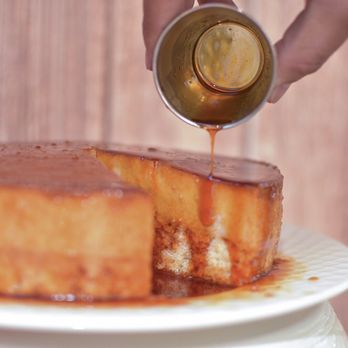 Joy Delights - a piece of cake being drizzled with caramel - Desserts Near Me - Miami, Florida Joy Delights - a piece of cake being drizzled with caramel - Desserts Near Me - Miami, Florida