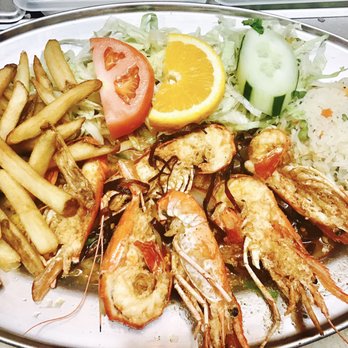 El Gallo Bravo - a plate of grilled shrimp and french fries - Mexican Near Me - Chicago, Illinois El Gallo Bravo - a plate of grilled shrimp and french fries - Mexican Near Me - Chicago, Illinois