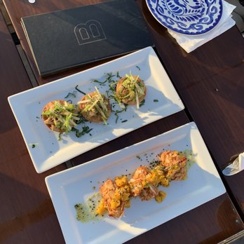 Buccanos At Night - Mahi mahi Tuna tartare tostadas & almond crusted Buffalo mozzarella with grilled shrimp. Both were good but not sure we would order again. - Bars Near Me - Cozumel, ROO