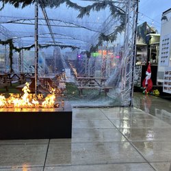 Honeycuspe - The outdoor seating area was covered and had a fire place for ambience.