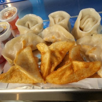 The Dumpling Hero - a plate of dumplings and dipping sauces - Food Trucks Near Me The Dumpling Hero - a plate of dumplings and dipping sauces - Food Trucks Near Me