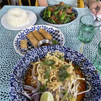 Koh Lipe - Khao Soi, spring rolls, some crispy pork and broccoli with rice. - Thai Near Me - Toronto, Ontario